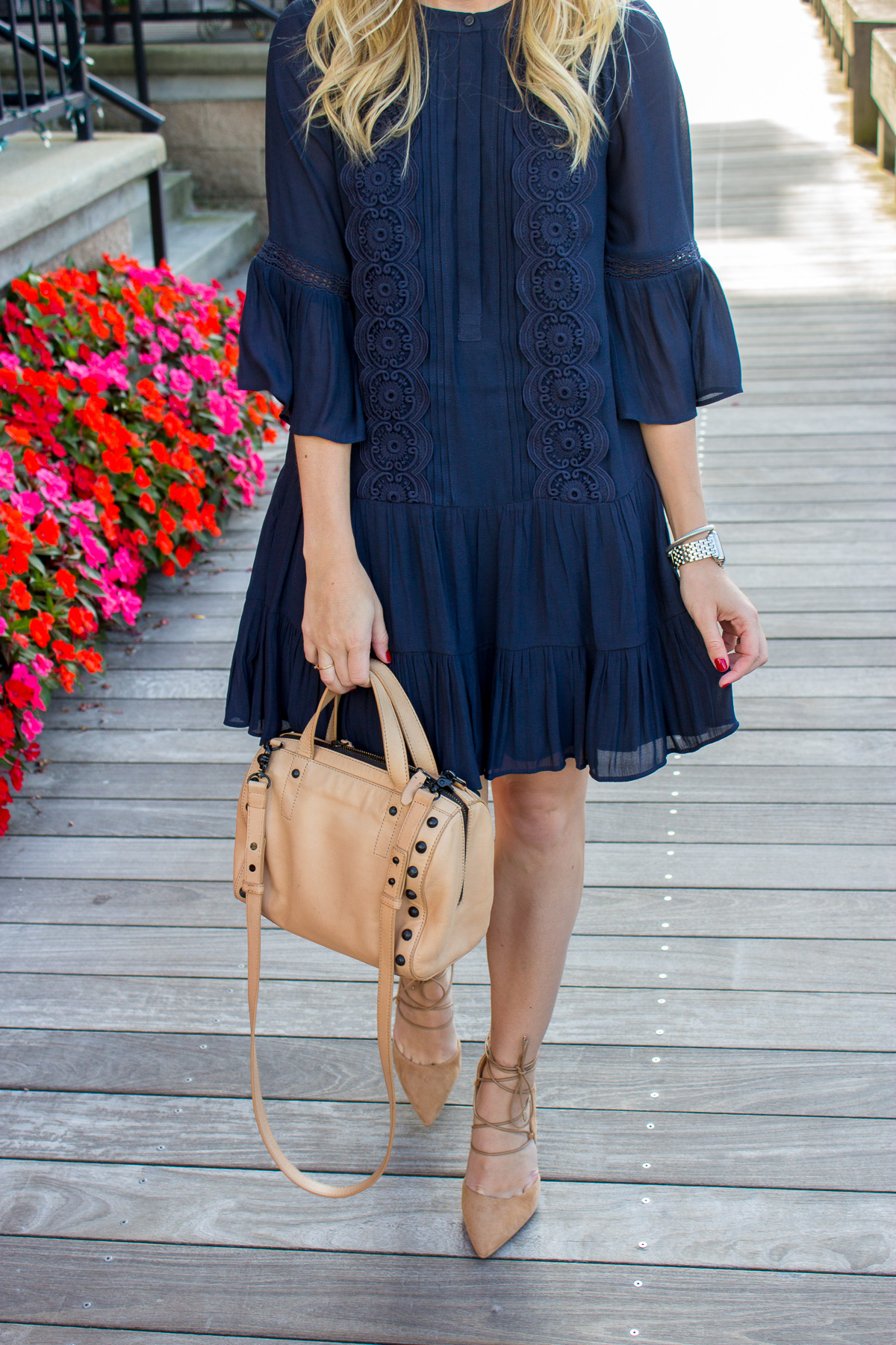Navy Flounce Dress with Neutral Accessories